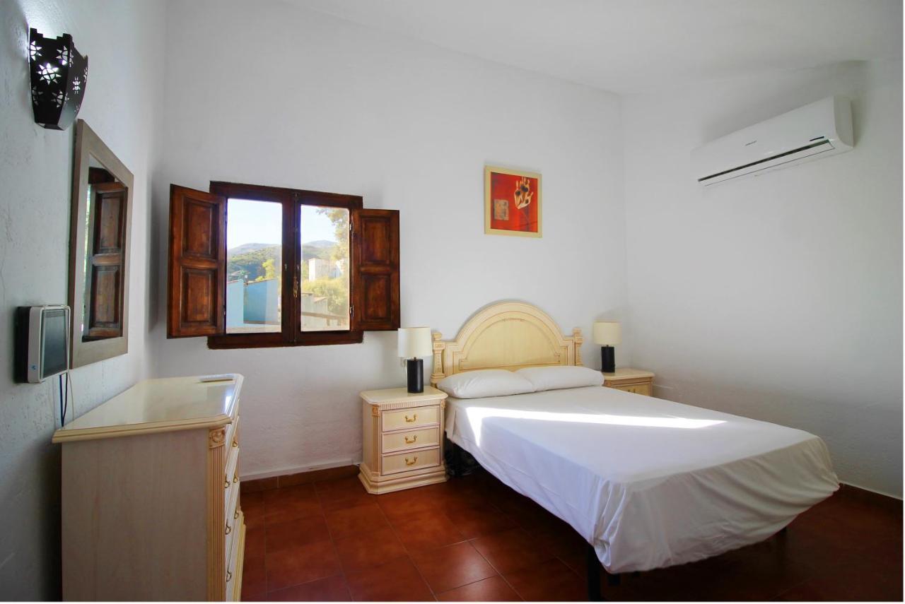 Casas Rurales Juzcar Centro Esterno foto