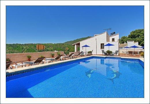 Casas Rurales Juzcar Centro Esterno foto