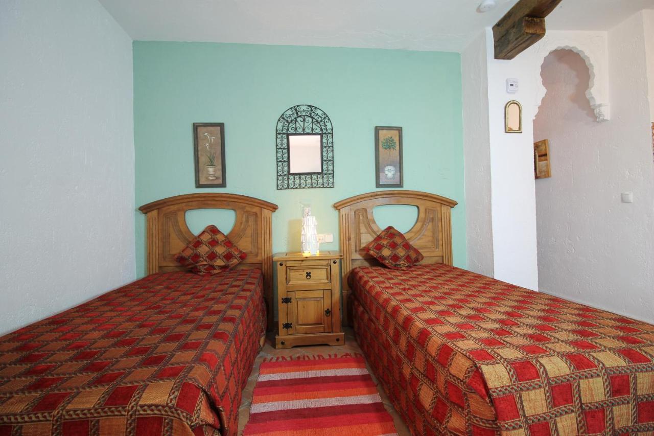 Casas Rurales Juzcar Centro Esterno foto