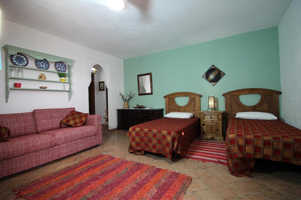 Casas Rurales Juzcar Centro Esterno foto